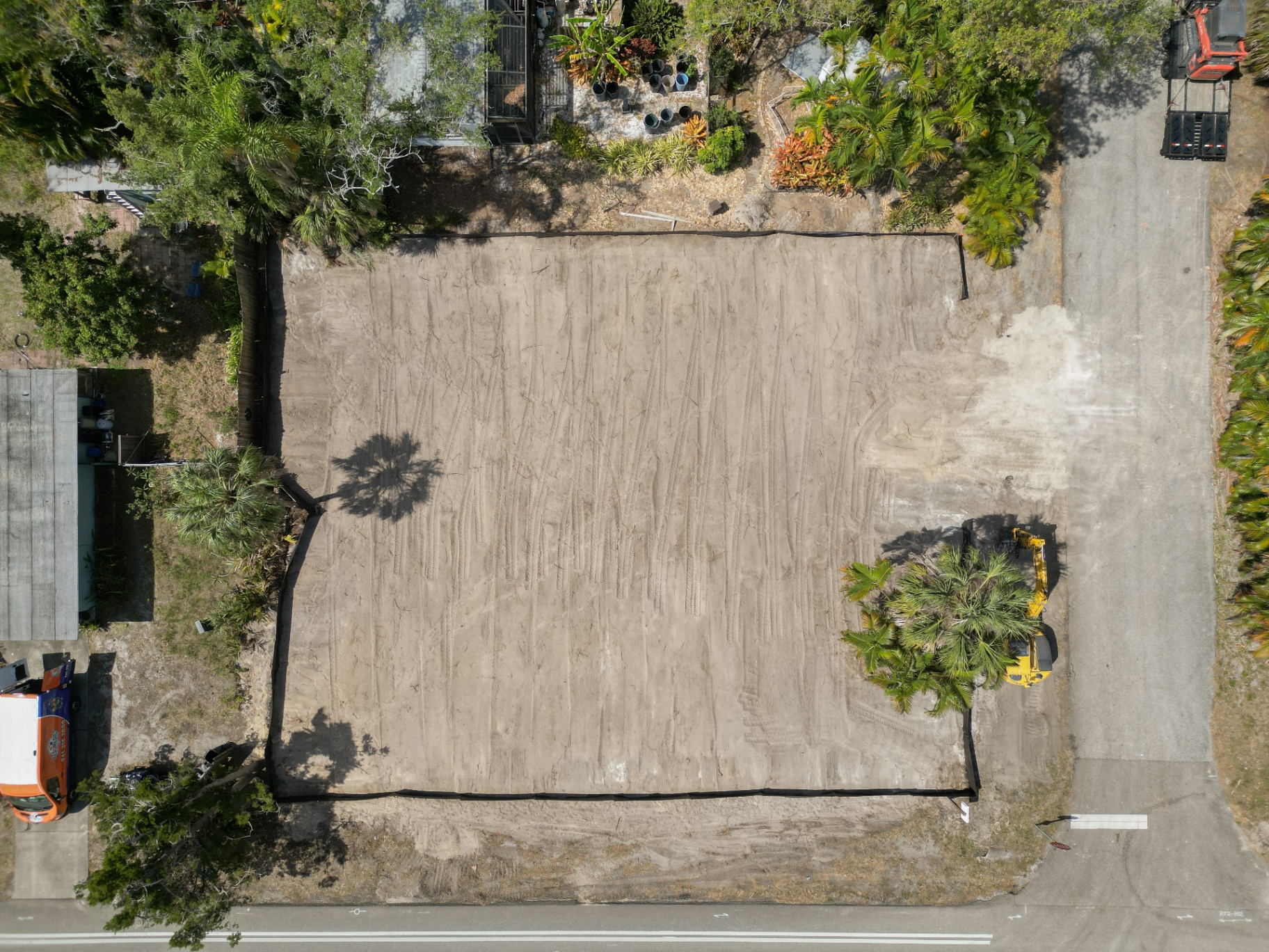 Top-down aerial view of fully cleared and graded site