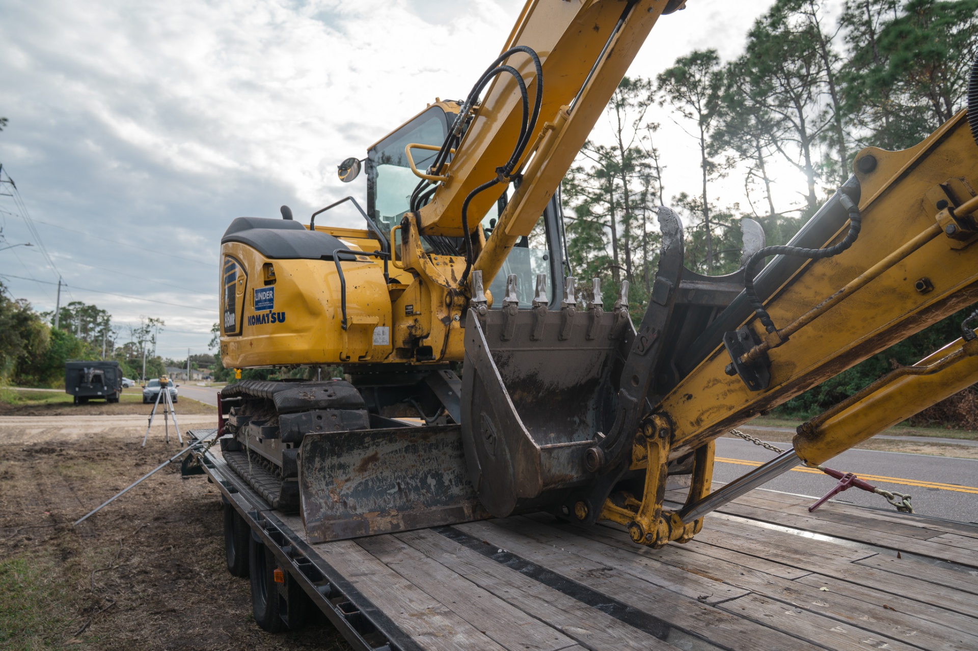 Komatsu excavator loaded on trailer