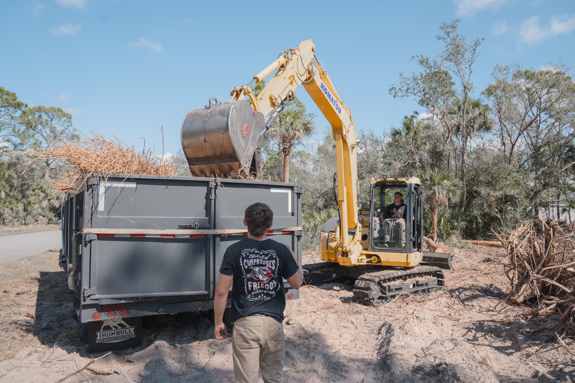 Loading debris with excavator